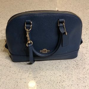Blue crossbody Coach bag